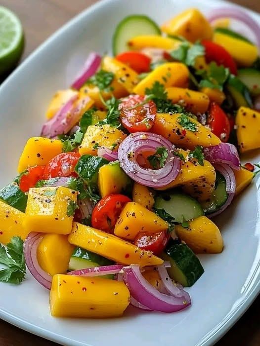 Juicy Mango Tossed with Crisp Veggies and a Bright Citrus Lime Dressing: A Celebration of Freshness, Flavor, and Balance